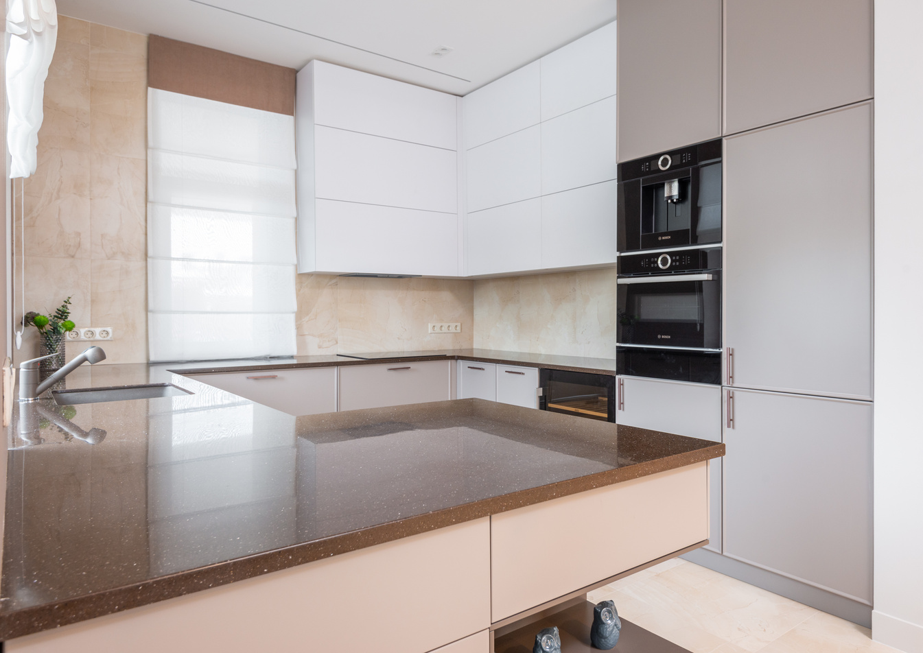 Kitchen interior with beige furniture